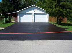 Residential Driveway recently seal coated in Aurora IL
