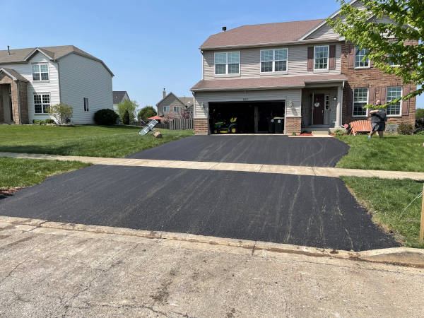 House with paved driveway